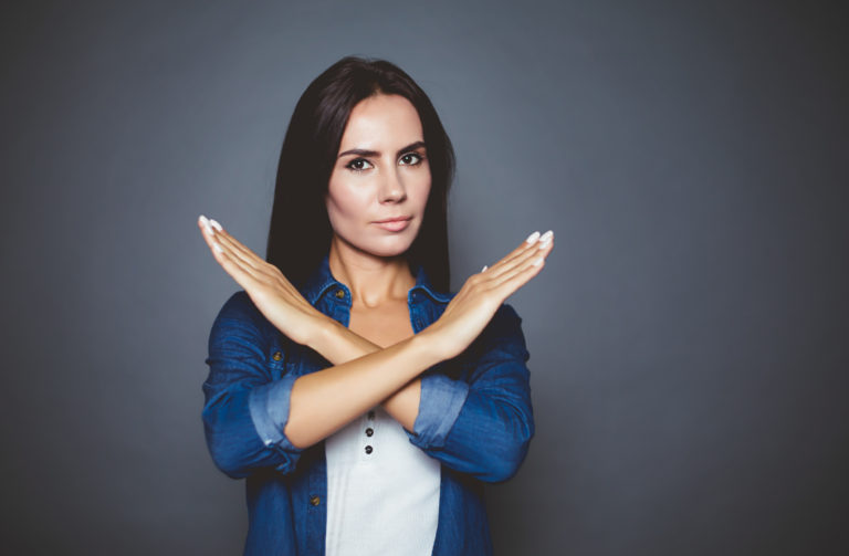 body language etiquette | arms making an X