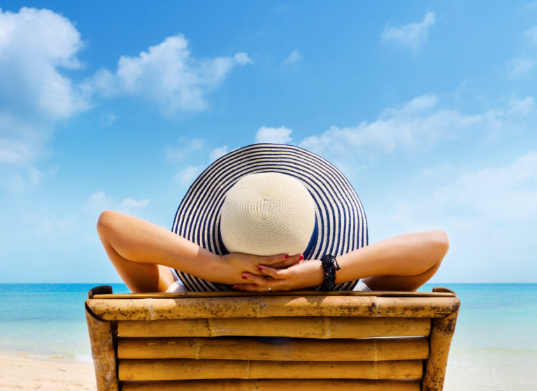 Benefits of Taking Time Off | Woman in Beach Hat