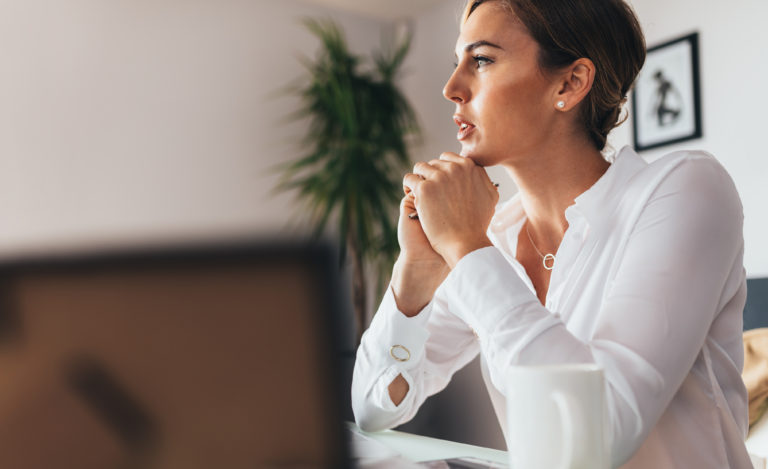 Questions to ask your boss | woman in deep thought