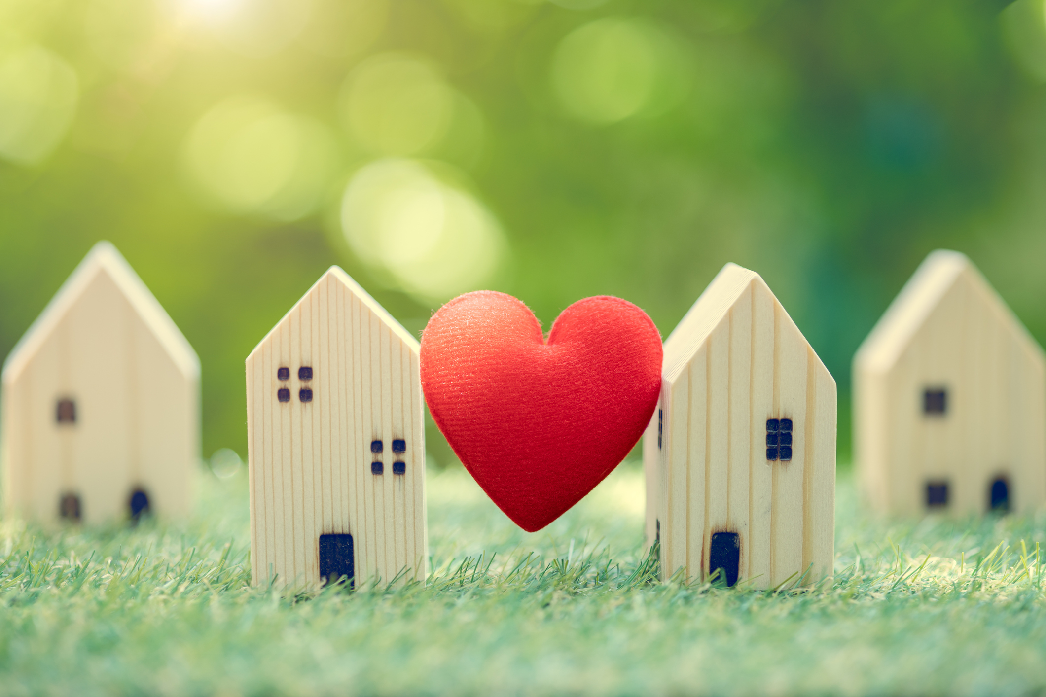 good neighbor | Love heart between two house wood model for stay at home for healthy community together on green fresh ecology natural environment.