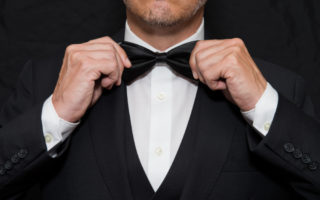 holiday dress code | closeup of man in tux