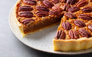 Pecan Pronunciation | pecan pie, one slice removed