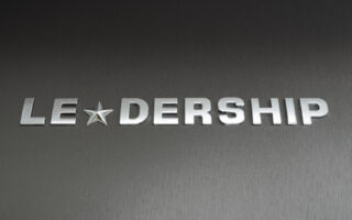 Keeping Your Word | Words "Leadership" in 3D letters on gray background