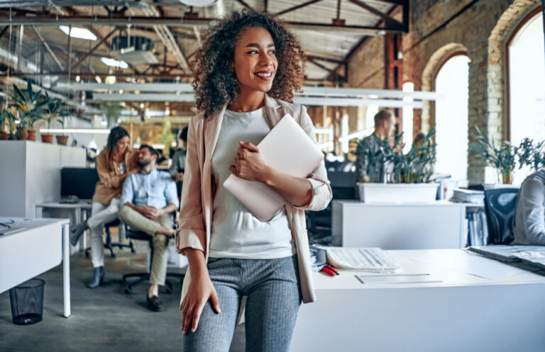 annoying habits | woman walking in office space