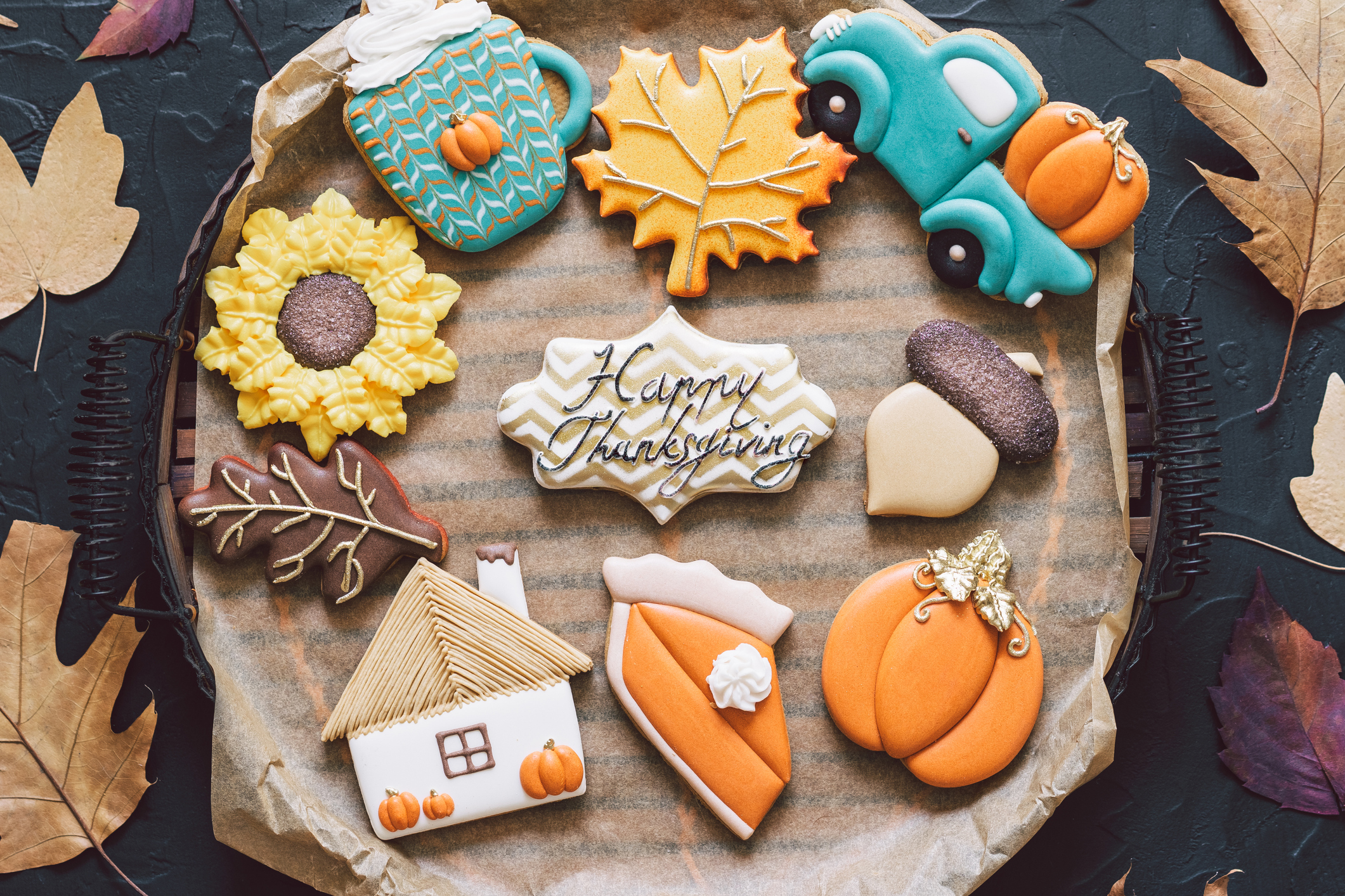 Thanksgiving Etiquette Q&A | tray of Thanksgiving sugar cookies, frosted in different fall colors