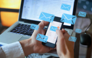 What Is the Etiquette for Responding to Emails, Work IMs and Social Media Comments? | email marketing concept, person reading e-mail on smartphone, receive new message