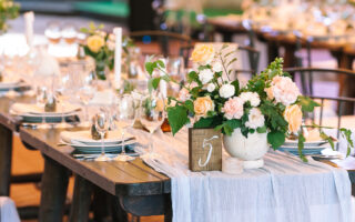 wedding etiquette for happy guests | beautiful wedding table setting with linens and pastel flowers