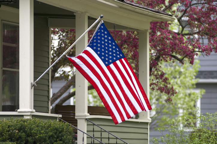 Fourth of July Etiquette | An American household has decided to mount their nations flag outside.