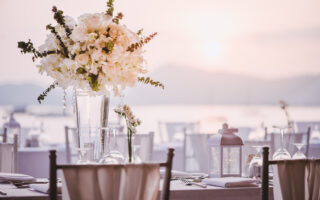 summer wedding etiquette | Table setting at a luxury wedding and Beautiful flowers on the table.