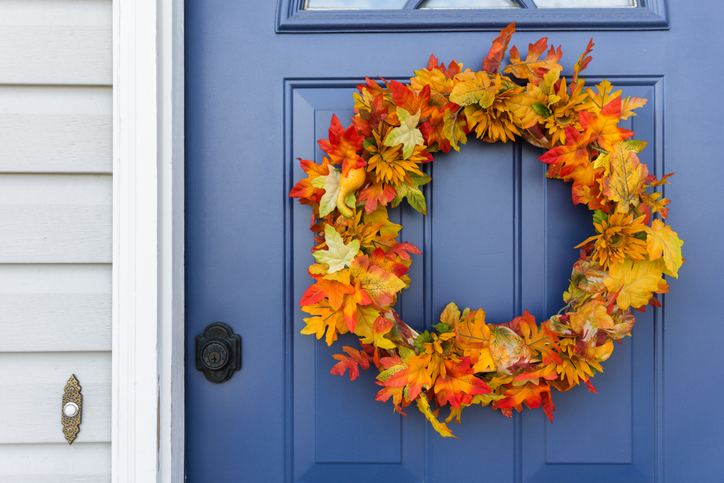 Preparing Your Home for Guests This Fall | Closeup of front door and decorative autumn wreath