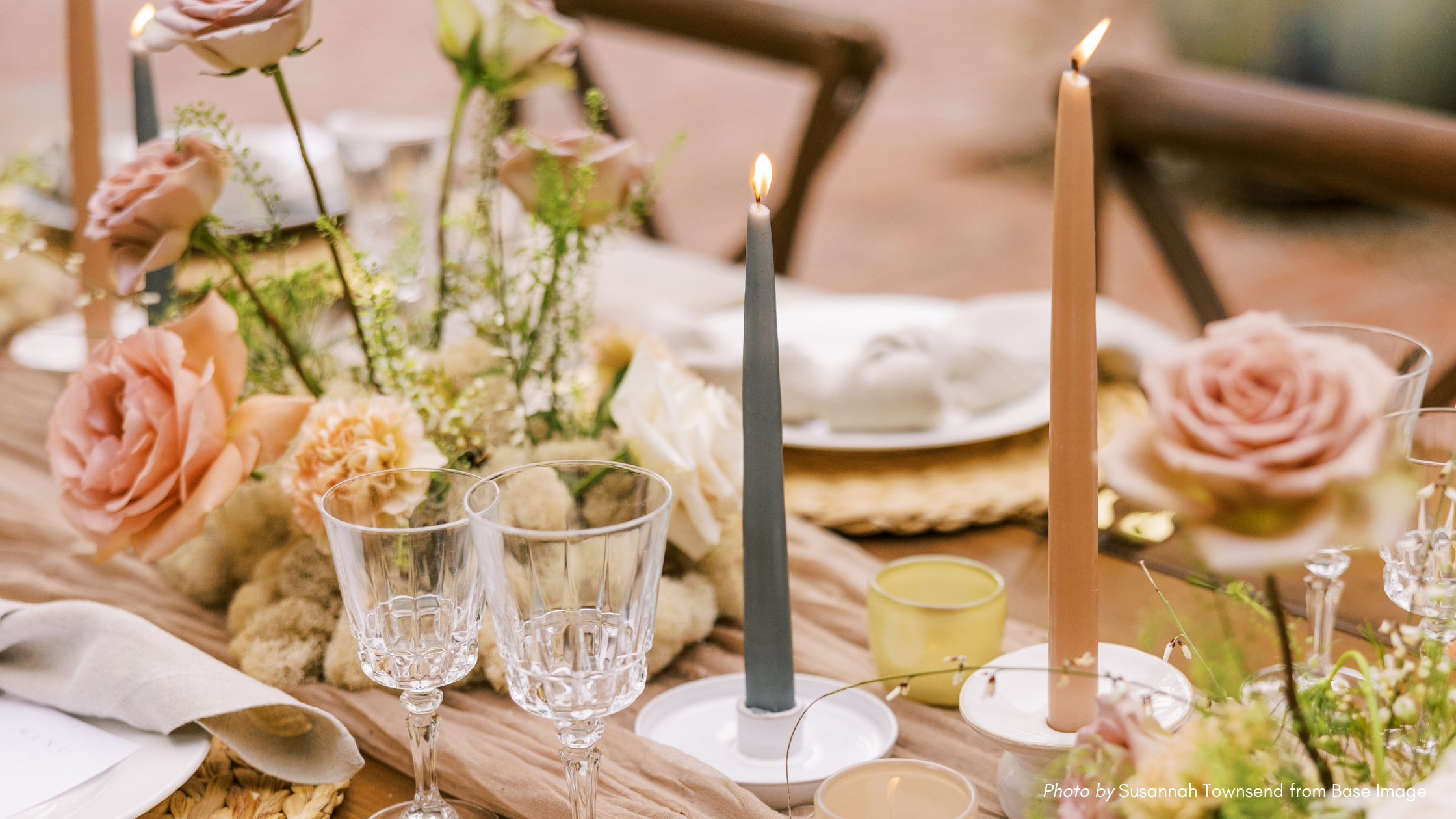 table set with candles and flowers to celebrate | how to politely split a birthday bill among friends