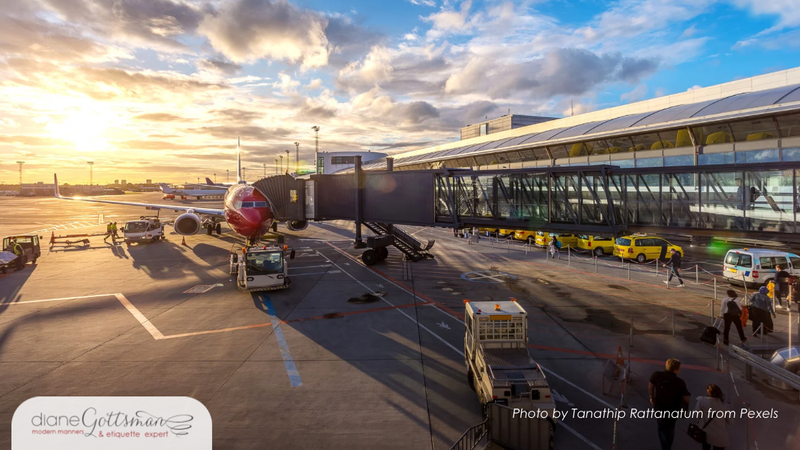 Labor Day Travel | Airplane at Airport, clouds in sky