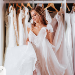 etiquette for canceling a wedding | bride-to-be trying on wedding gowns in a bridal shop