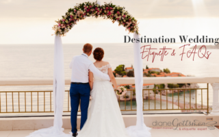 Destination Wedding Etiquette & FAQs | Couple at beach wedding looking out over the water through a flower arch