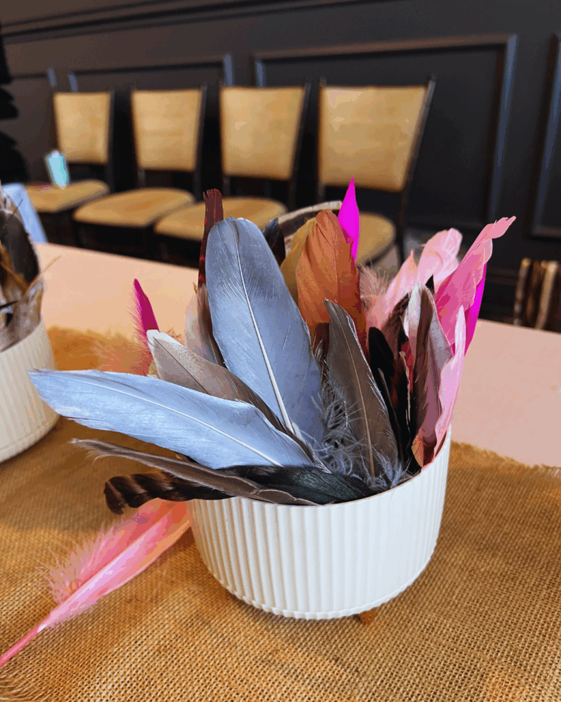 basket of beautiful feathers for cowboy hat adorning