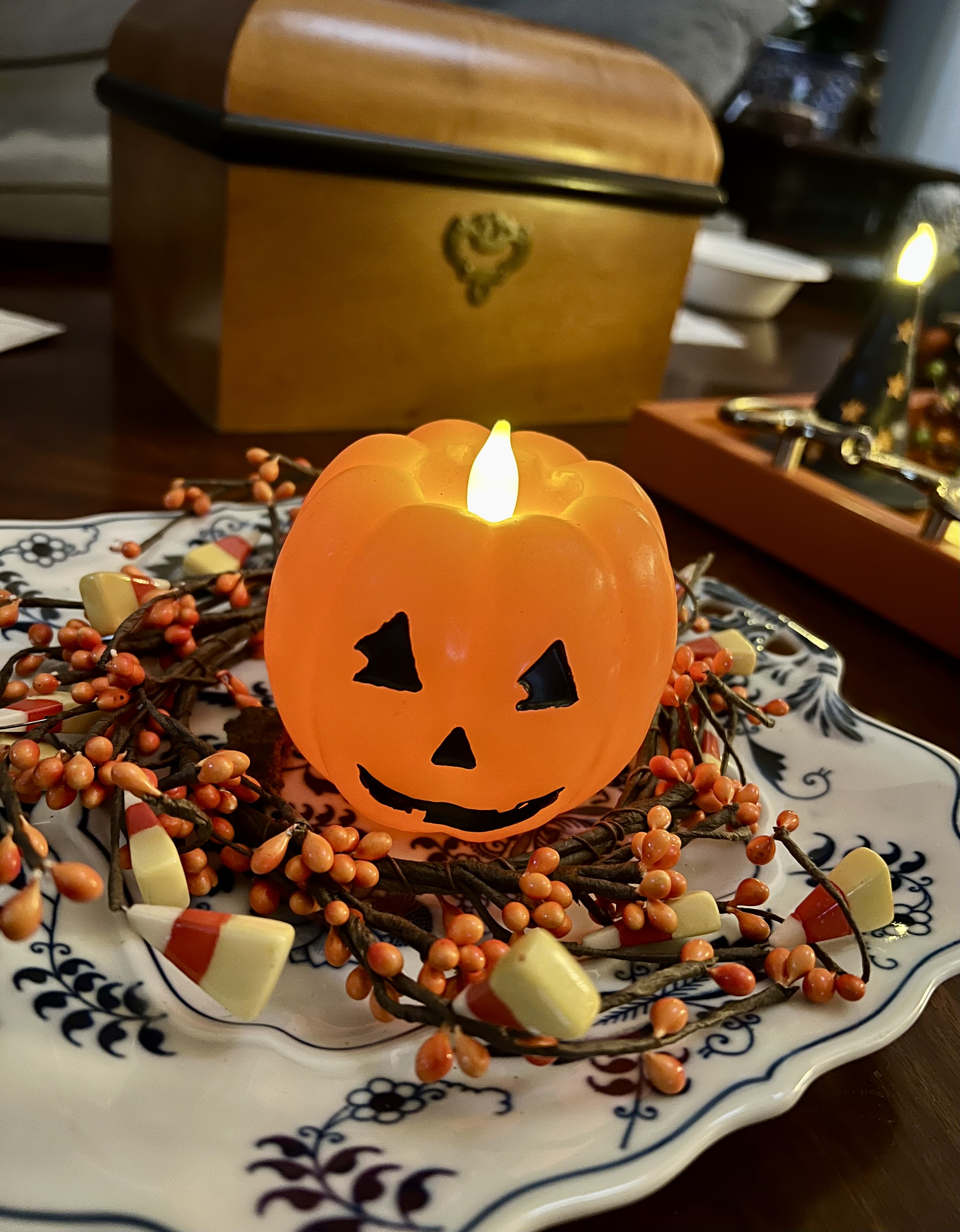Magical and memorable Halloween | plastic orange pumpkin with tea light, decorative setting
