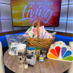 Things to release in the new year | various household items on the table of SA Living set, including cords, mugs, spices, and promotional items