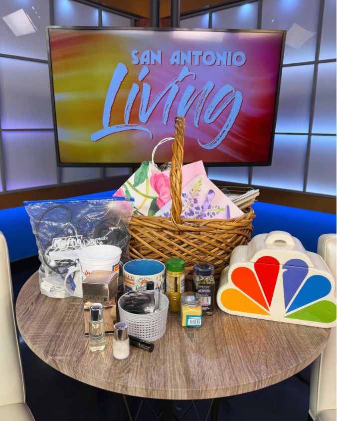 Things to release in the new year | various household items on the table of SA Living set, including cords, mugs, spices, and promotional items