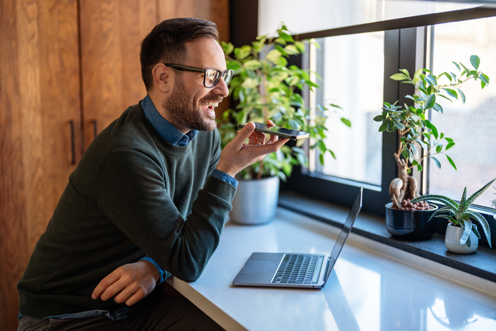 cellphone etiquette in public | Confident businessman executive coach in casual clothes using laptop computer, having video conference call virtual meeting, professional training negotiation, remote working from home.